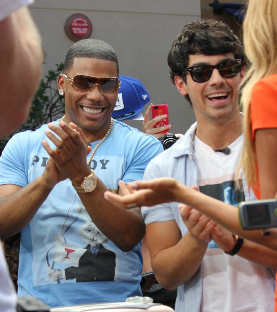 Nelly and Joe Jonas Appear on Extra at The Grove