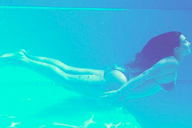 Kim Kardashian under water bikini