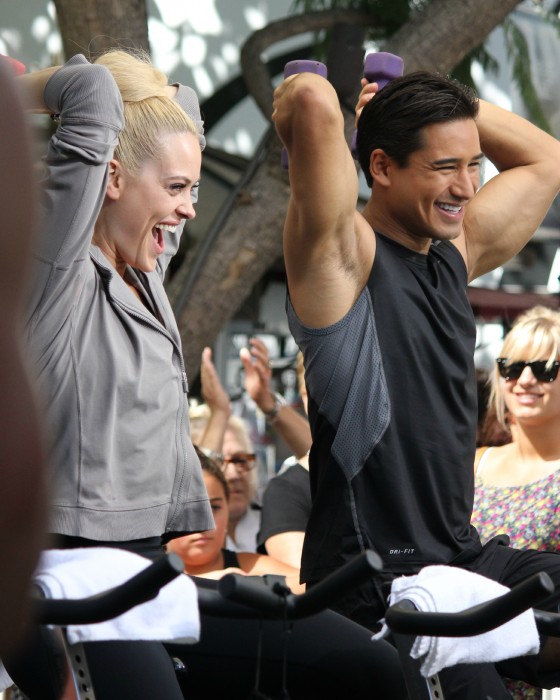 Peta Murgatroyd and Mario Lopez work out to promote LA Cycle House