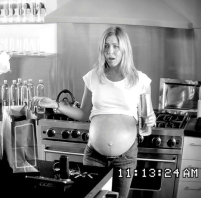 Jennifer Aniston hides baby bump for Smartwater commercial